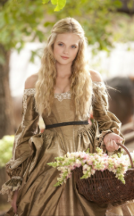                                        Ilustración 6 Tanto hombres como mujeres llevaban media melena con la raya en medio, siendo también habitual melenas largas y rizadas con trenzas en los laterales en mujeres